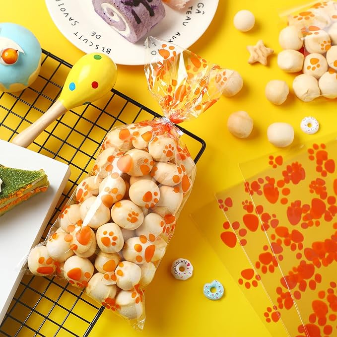 Blulu 100 Pieces Dog Treat Bags Puppy Party Favor Pet Paw Cone Cellophane Bags Candy Heat SealableDog Paw Gift with 100 Pieces Silver Twist Ties for Pet Cat Treat Party Favor(Orange)